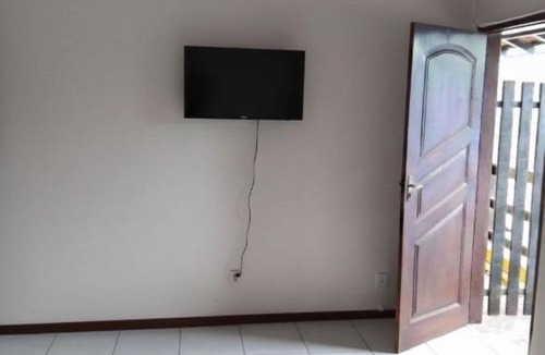 Pereque House | Comfortable accommodation with air conditioning and a fan. Well-Maintained Suite #3