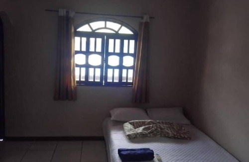 Pereque House | Comfortable accommodation with air conditioning and a fan. Well-Maintained Suite #3