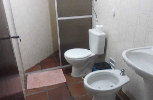 Guaratuba Apartment | Comfortable apartment in Guaratuba with swimming pool and beach 50 meters away