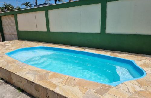 Indaia House | Confortável casa com piscina e churrasqueira a 100m da praia