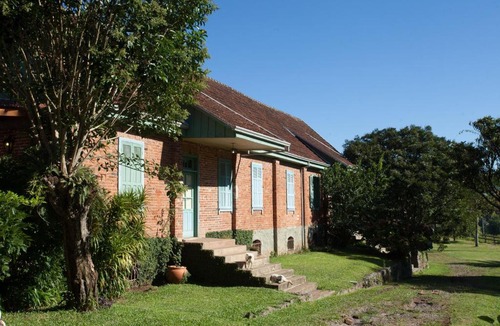 Farroupilha House | Conforto, história e arte - casa com calefação