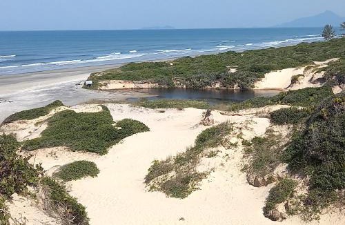 Ilha Comprida House | Conforto Laranja