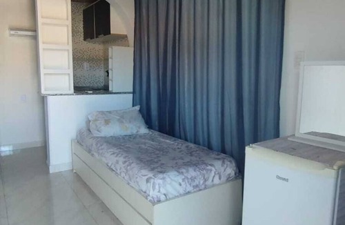 Guaratiba Apartment | Container Black