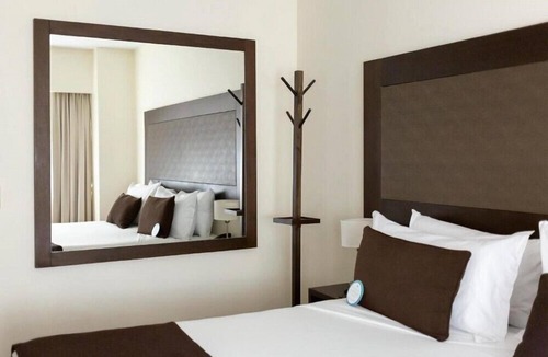 El Centro Hotel | Cozy 1BR Condo A Short Ride Away from Plaza San Martin Square