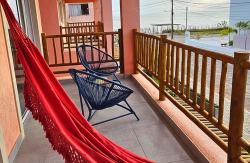 Sao Miguel de Touros Ski Chalet | Cozy beachfront room, ideal for couples.