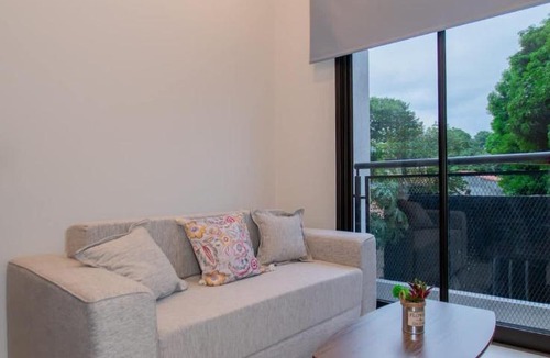 Fernando De La Mora Apartment | Cozy One-Bedroom Apartment with Sofa Pool and Cowork