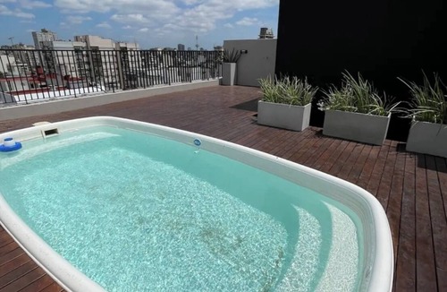 Comuna 7 Apartment | Cozy two-bedroom apartment, excellent location, 24-hour security, pool barbecue.