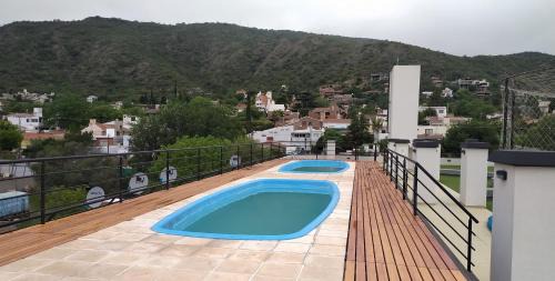 Villa Carlos Paz Apartment | Depto céntrico excelente ubicación, con cochera, pileta y patio