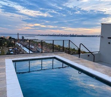 Encarnacion Apartment | Edificio Paraná Playa Costanera, Apartamento de 1 Habitación, vista frontal al Rio con parking y Amenities!