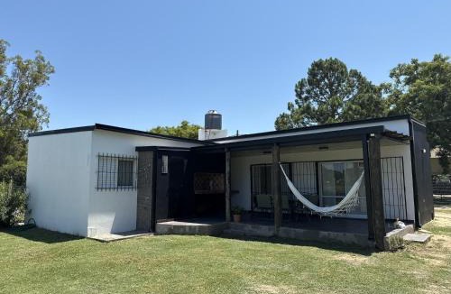 Arroyo Leyes House | Entreverdes, Casas de alquiler - Casa Jacarandá