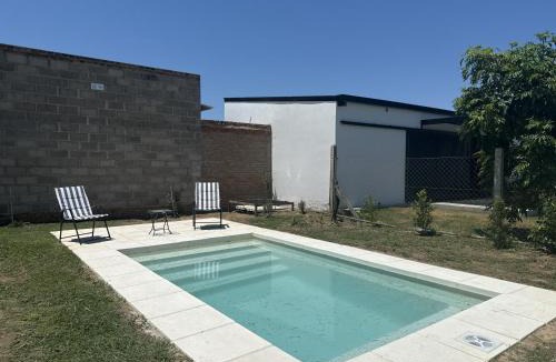 Arroyo Leyes House | Entreverdes, Casas de alquiler - Casa Jacarandá