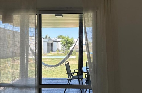 Arroyo Leyes House | Entreverdes, Casas de alquiler - Casa Jacarandá