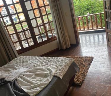 Marechal Candido Rondon House | Equilíbrium Quarto de casal com banheiro compartilhado