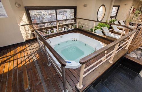 Microcentro Hotel | Escape to a Tranquil Room Near Puerto Madero Riverfront Dining | Rooftop Pool