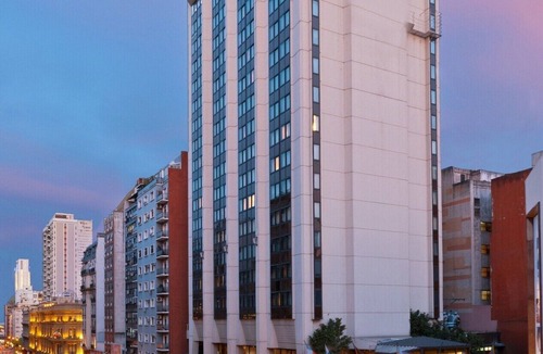 Microcentro Hotel | Escape to a Tranquil Room Near Puerto Madero Riverfront Dining | Rooftop Pool