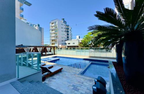 Itacolomi Apartment | Espaço amplo e confortável 3 Quartos, Churrasqueira, Cozinha completa, 180m da Praia, Wi-Fi, vaga de garagem , Piscina