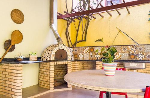 Carapicuiba House | Espaço gourmet e home-office na Granja