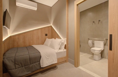 Aeroporto Internacional Governador Andre Franco Montoro Hotel | Fast Sleep Suites by Slaviero Hotéis dentro do Aeroporto Guarulhos Terminal 2, desembarque Oeste