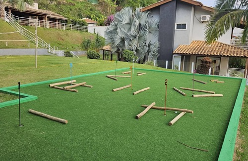 Tres Pontes House | Fireplace, swimming pool, 4 suites, private mini-golf, gated community with 24-hour security.