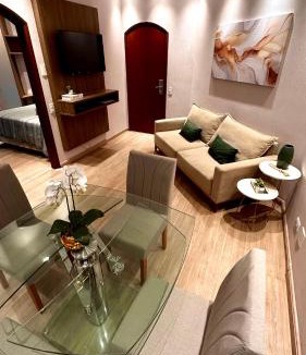 Gonzaga Hotel | Flat Cosmopolitan Praia no Gonzaga com Varanda - Estacionamento Incluso