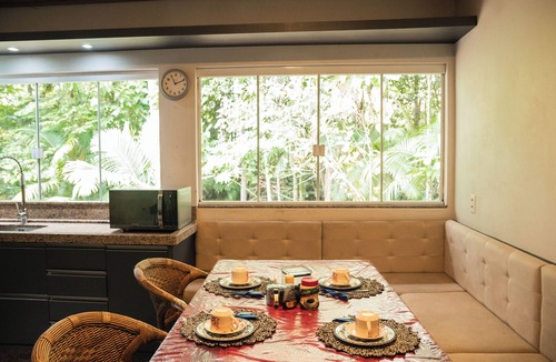 Sao Joao Batista Cottage | Grandma Cida's Corner - A cozy and modern place surrounded by nature.