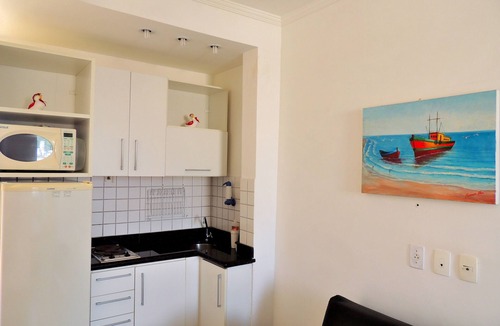 Pitangueiras Apartment | Guaruja, Pitangueiras beach, flat with services.
