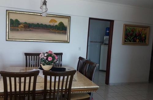 Guilhermina Apartment | High standard beach front av beach with parasol chairs installed on the beach