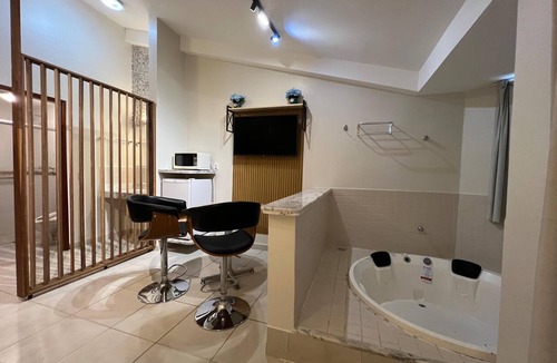 Prive das Caldas Hotel | Hot Springs Flat Apart Hotel c. Banheira