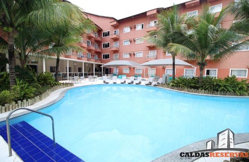 Setor Lagoa Quente Apartment | LAGOA QUENTE HOTEL - Apartamento 229 - 01º Andar - SUÍTE ESMERALDA - 01 quarto, sala, cozinha e banheiro *com fogão*