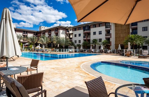 Smin Apartment | Life Resorts L 306 - Studio Beira Lago - 6 min da Esplanada - Piscina, academia, sauna, garagem - By Hospede Fácil