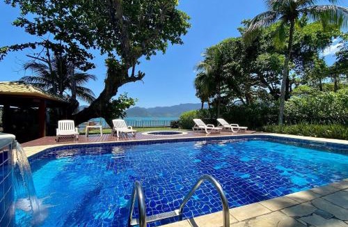 Lazaro House | Magnífica casa pé na areia 4 suítes c/ar e piscina