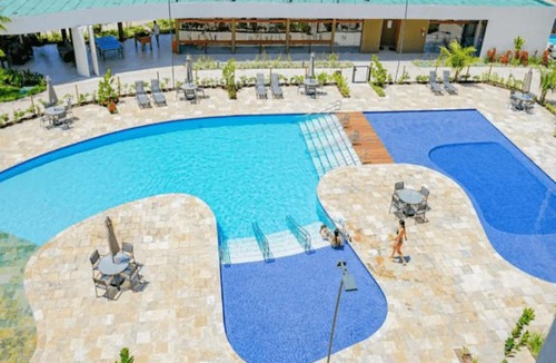 Nossa Senhora do O House | Mana Beach Experience - Flats em Muro Alto por Yolo