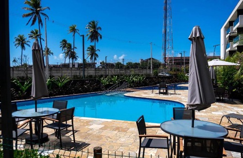 Nossa Senhora do O House | Mana Beach Experience - Flats em Muro Alto (CM) por Yolo