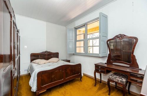 Bacacheri House | Memora Guesthouse Curitiba - Quartos em Casa próximo ao Parque Bacacheri