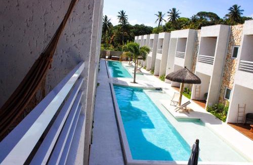 Passo de Camaragibe Apartment | MHV Milagres - Casa Corais, Curimã D9 A charming retreat in a comfortable setting, just a few meters from Marceneiro Beach.