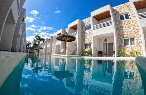 Passo de Camaragibe Apartment | MHV Milagres - Casa Corais, Curimã D9 A charming retreat in a comfortable setting, just a few meters from Marceneiro Beach.