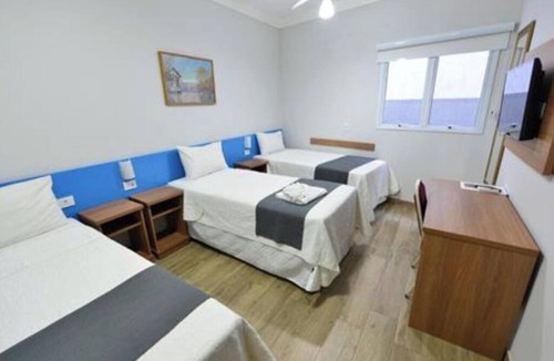 Iguacu Hotel | Minimalist Room for Modern Comfort | Free Breakfast | Ipatingao Stadium - 2.1 mi