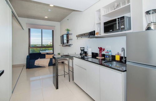 Luque Apartment | Modern Studio in Luque | Rooftop Pool & Fast WiFi