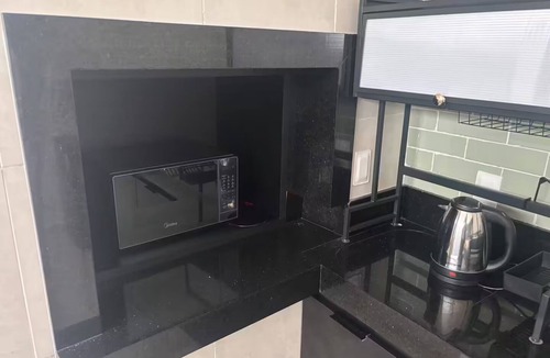 Petrolina Apartment | Modern studio in the city center | Kitchen and AC