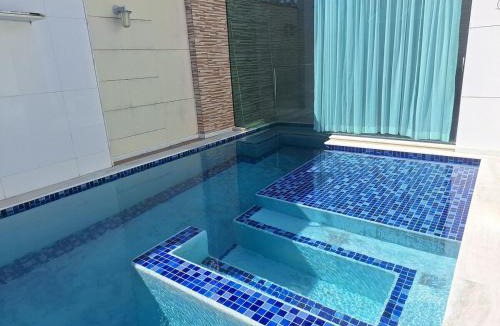 Taperapua Beach House | Paulo Gonzaga · Refúgio beira-mar 4 suítes - Praia Taperapuan