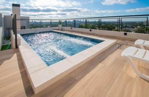 Fernando De La Mora Apartment | Peaceful Stay with Rooftop Pool Access U214