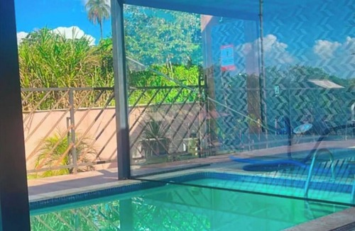 Sao Joaquim De Bicas Cottage | Perfect retreat with pool, lagoon and sand court.
