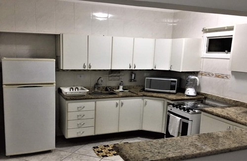 Pitangueiras Apartment | Pitangueiras Center, 70 meters from the beach, near shopping mall/restaurants/market/bank