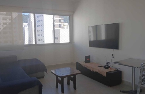 Vila Maia Apartment | Pitangueiras Center, Ocean View, Air Conditioning, 3 bedrooms, balcony, 1 parking space, barbecue.