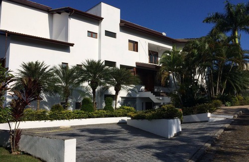 Santa Rita House | Privacidade e conforto na luxuosa Peninsula Porsche no condominio Santa Rita