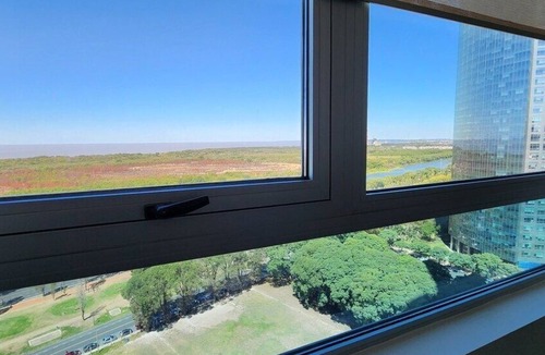 Buenos Aires Central Business District Apartment | Puerto Madero 20th Floor River View in front of Hilton