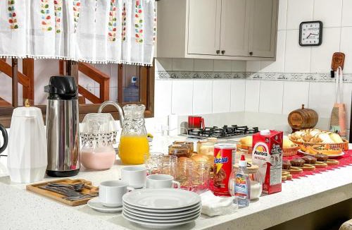 Ze Amandio Bed & Breakfast | Quarto 1 - Hospedaria Orquídeas de Bombinhas - com delicioso café da manhã incluso