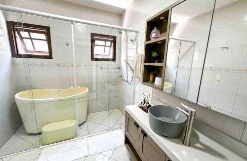 Ze Amandio Bed & Breakfast | Quarto 1 - Hospedaria Orquídeas de Bombinhas - com delicioso café da manhã incluso