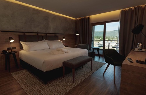 Villa General Belgrano Hotel | Relaxing Stay: Outdoor Hot Tub, Sauna & Tennis Courts | Near Brewer Park