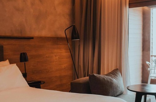 Villa General Belgrano Hotel | Relaxing Stay: Outdoor Hot Tub, Sauna & Tennis Courts | Near Brewer Park